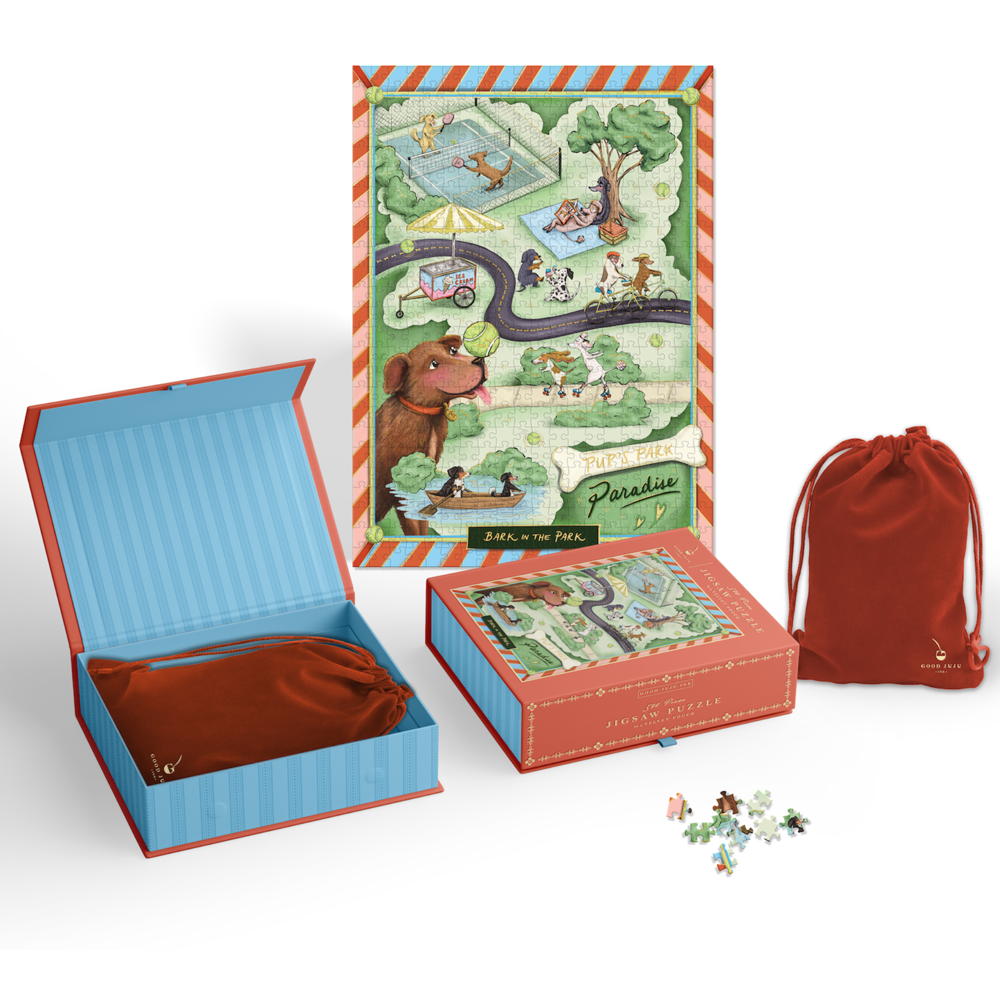 Dog jigsaw puzzle of playful pups in a park with gold foil accents in a magnetic keepsake box