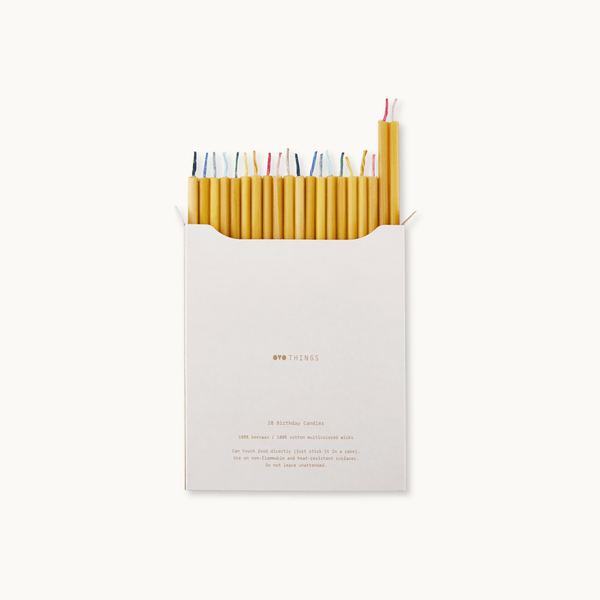 Set of birthday beeswax candles in a white box with 'OVO Things' branding.