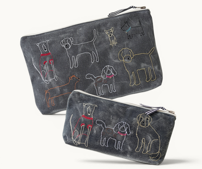 Two dark grey pouches with embroidered dog illustrations