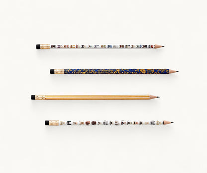 Pencil set with four intricately designed pencils on a white background