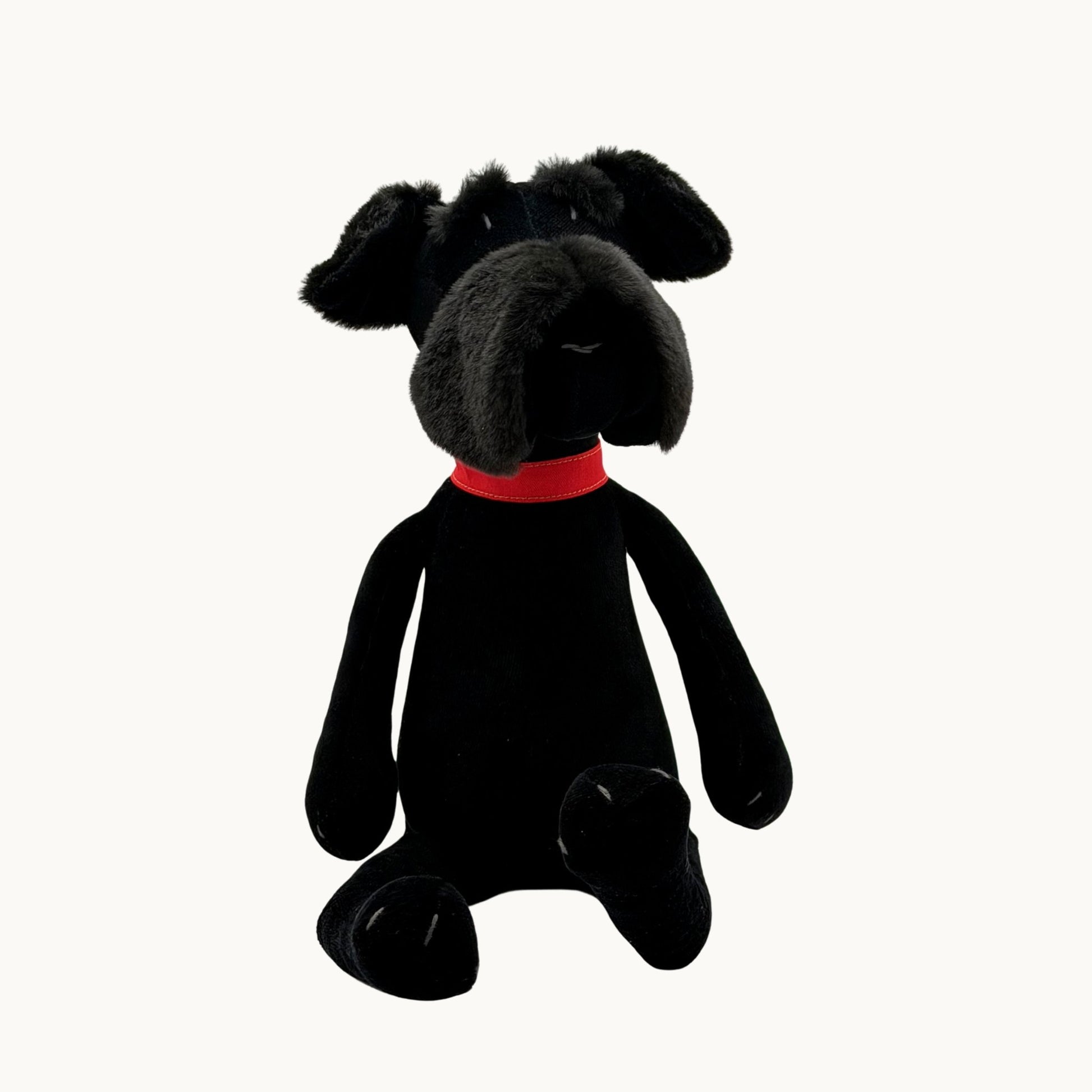 Sascha the Schnauzer from children's picture book dog+girl black plush dog toy with a red collar on a white background.Sascha plush. dog+girl plush. plush dog. stuffed animal.