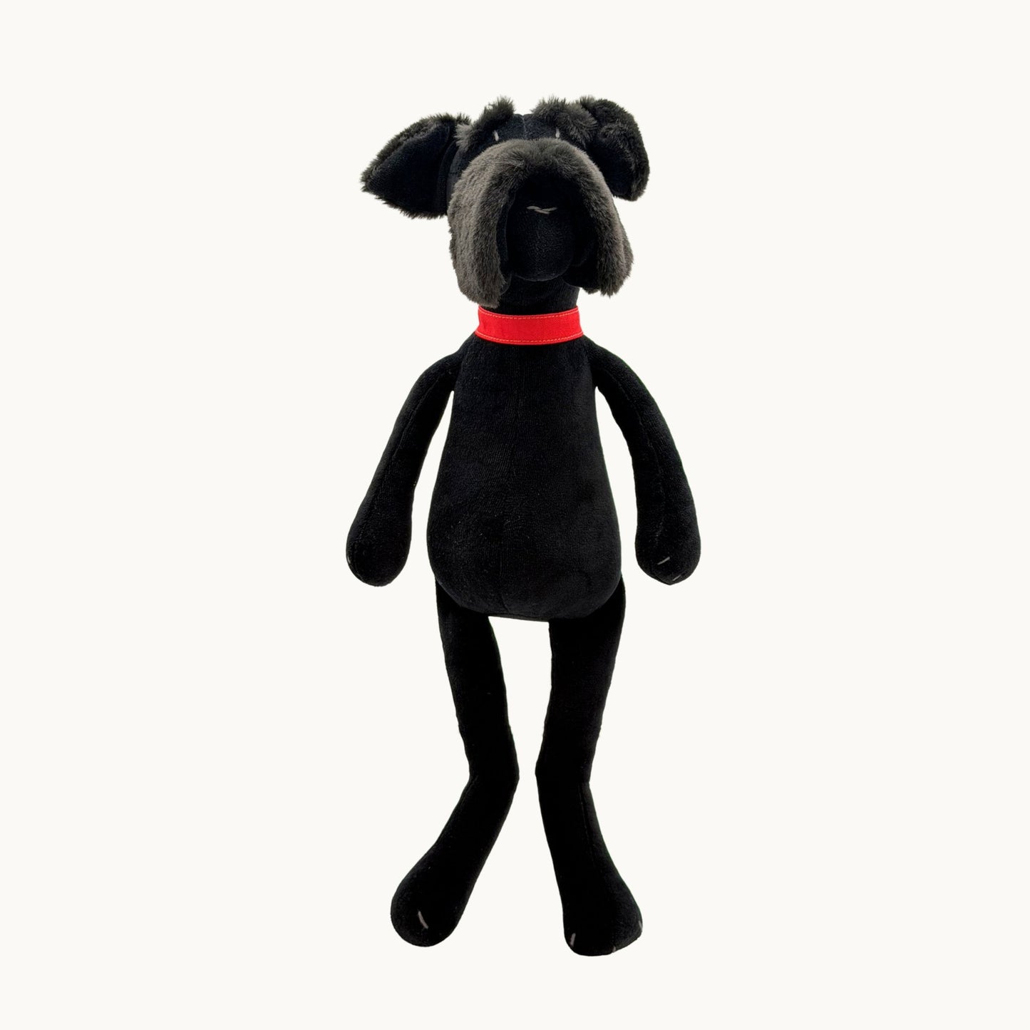 Sascha the Schnauzer from children's picture book dog+girl black plush dog toy with a red collar on a white background. Sascha plush. dog+girl plush. plush dog. stuffed animal.