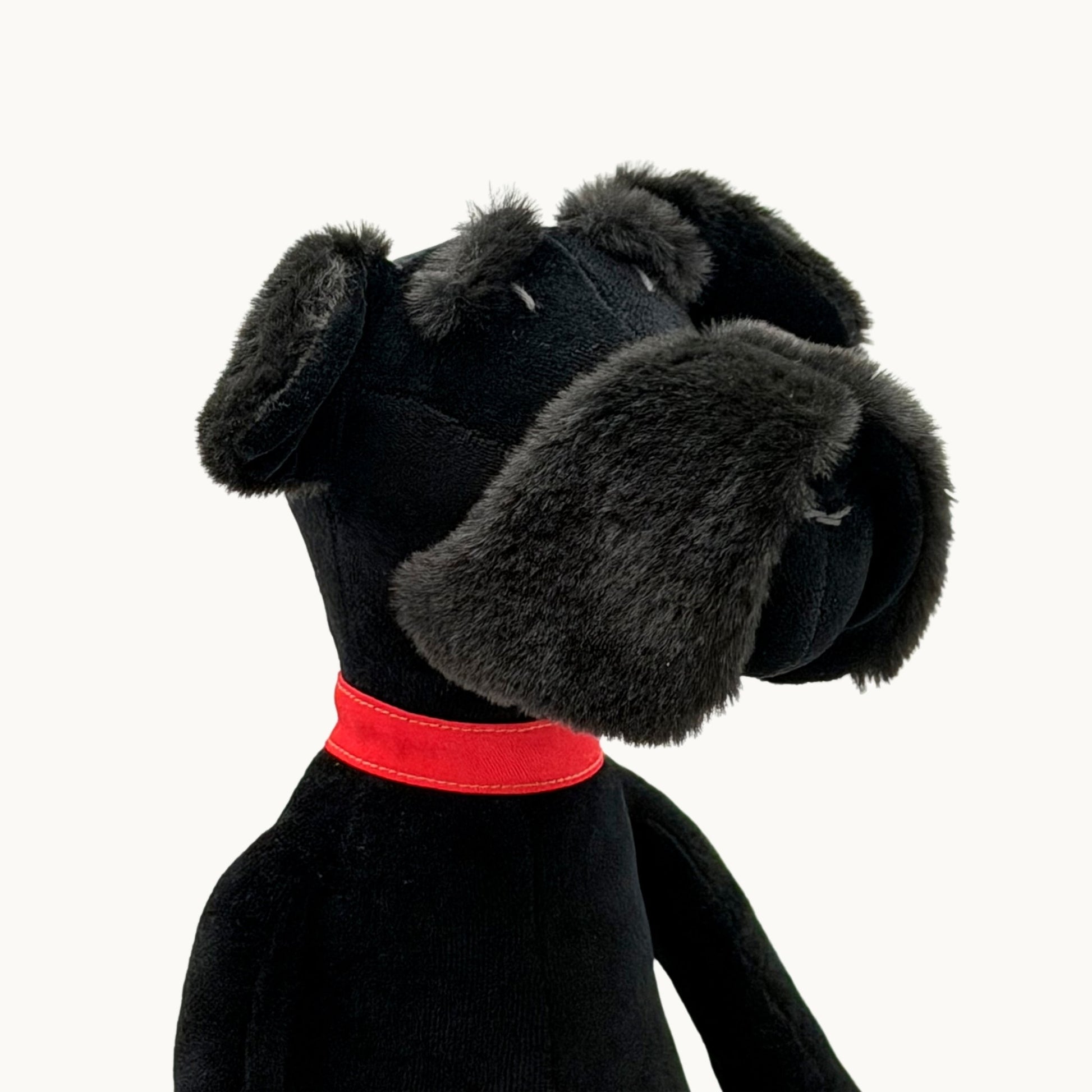 Sascha the Schnauzer from children's picture book dog+girl black plush dog toy with a red collar on a white background.Sascha plush. dog+girl plush. plush dog. stuffed animal.