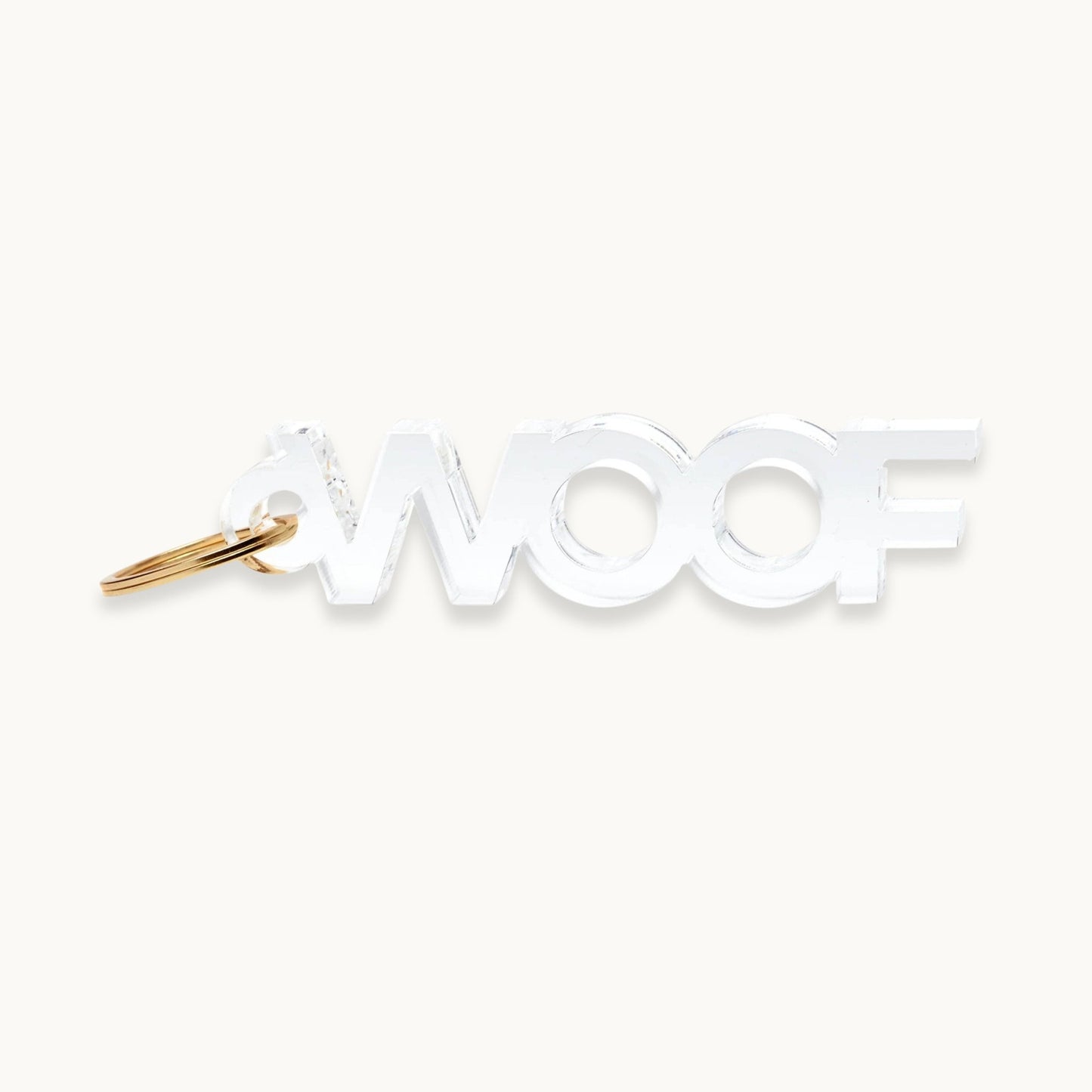 Clear 'WOOF' dog acrylic keychain with gold key ring.